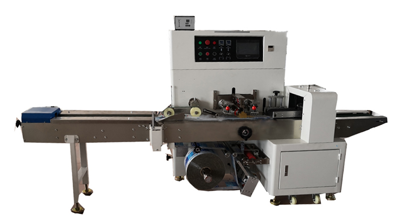 Horizontal flow wrapper-bottom reel holder